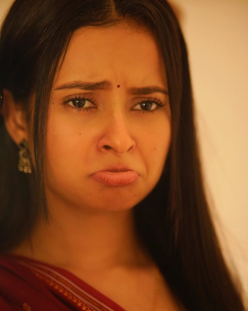Aarushi Baruah wearing beautiful maroon saree in cute photoshoot