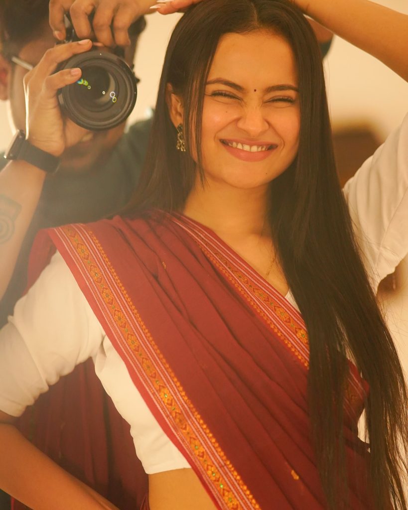 Aarushi Baruah wearing beautiful maroon saree in cute photoshoot