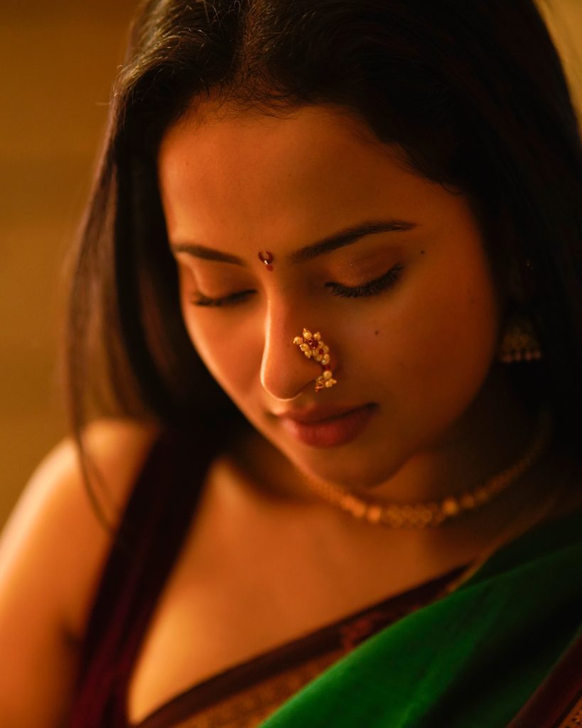 Actress Aarushi Baruaah glamorous photos in green saree