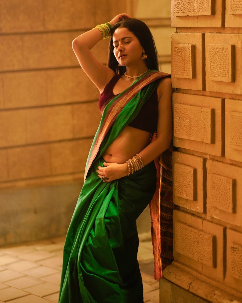 Actress Aarushi Baruaah glamorous photos in green saree