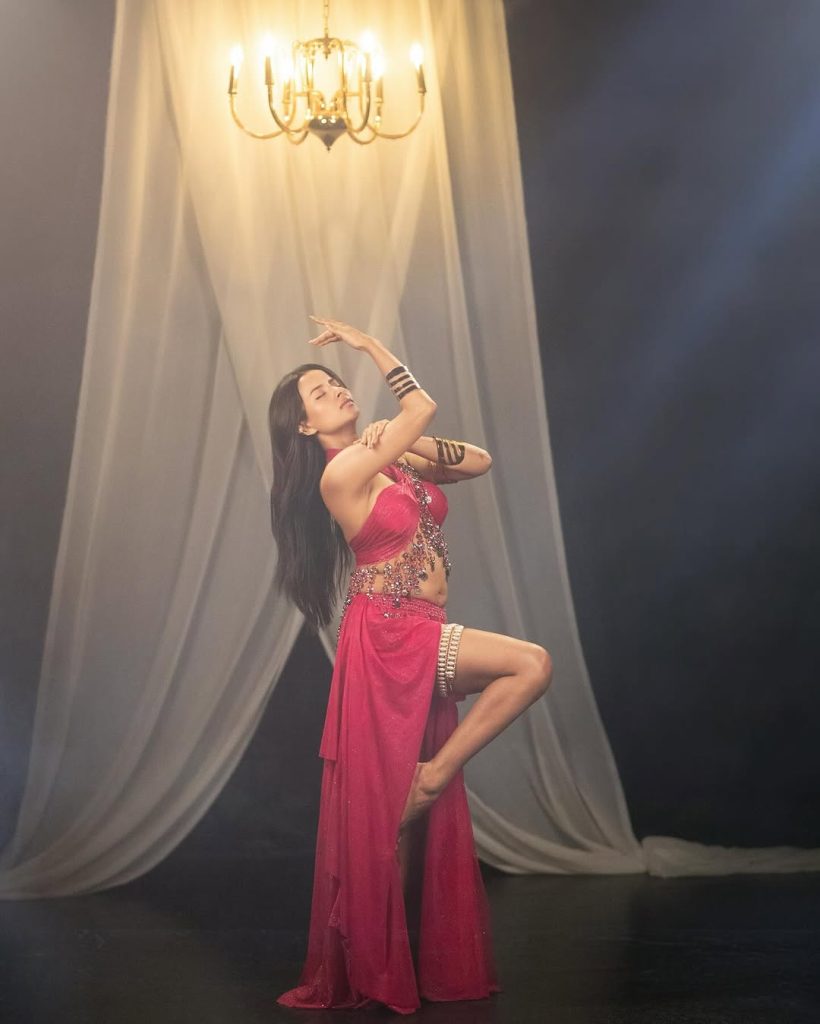 Aarushi Baruah's bold makeup with pink dress