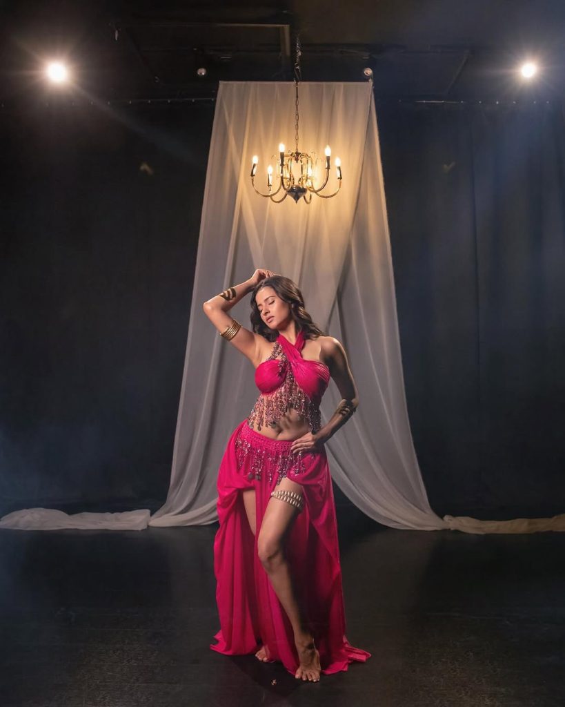Aarushi Baruah wearing stylish pink dress in glamorous photoshoot