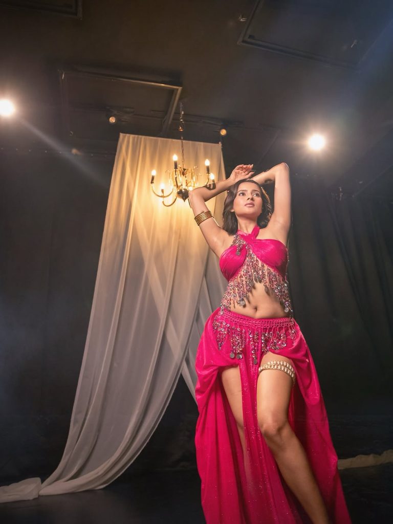 Aarushi Baruah wearing stylish pink dress in glamorous photoshoot