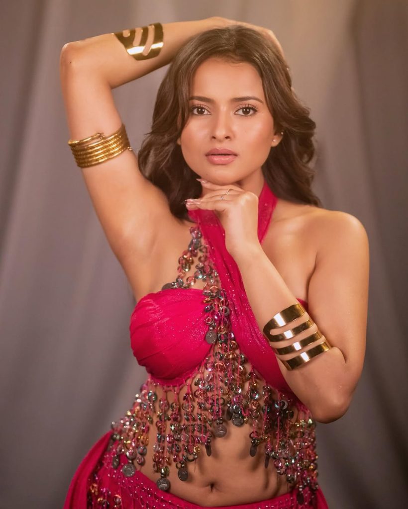 Aarushi Baruah wearing stylish pink dress in glamorous photoshoot