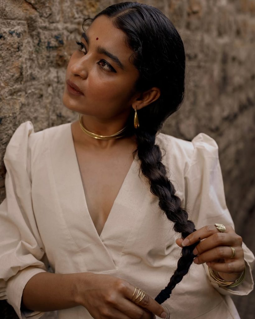 Chaithra J Achar's natural makeup with white dress styling