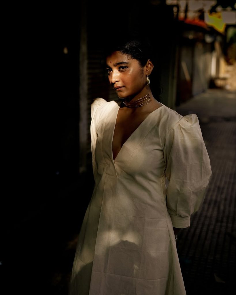 Chaithra J Achar's natural makeup with white dress styling