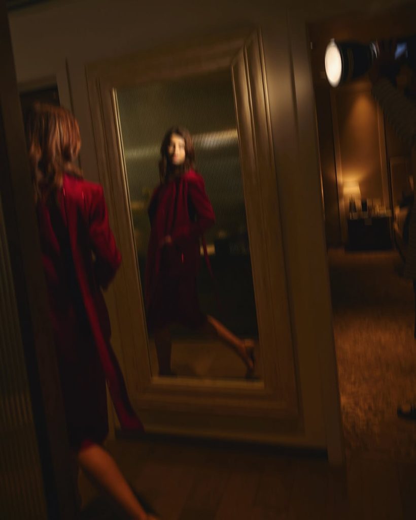 Full-body shot of Diana Penty's complete red outfit styling