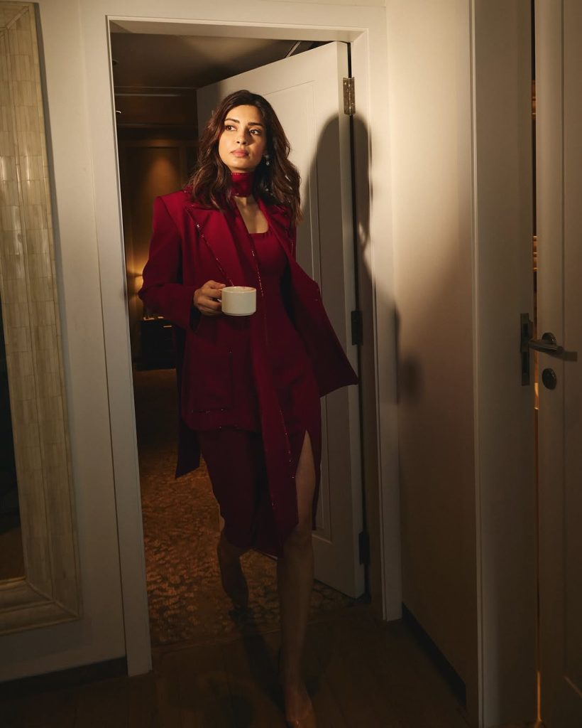 Diana Penty wearing striking red outfit in professional photoshoot