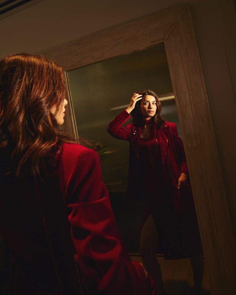 Diana Penty wearing striking red outfit in professional photoshoot