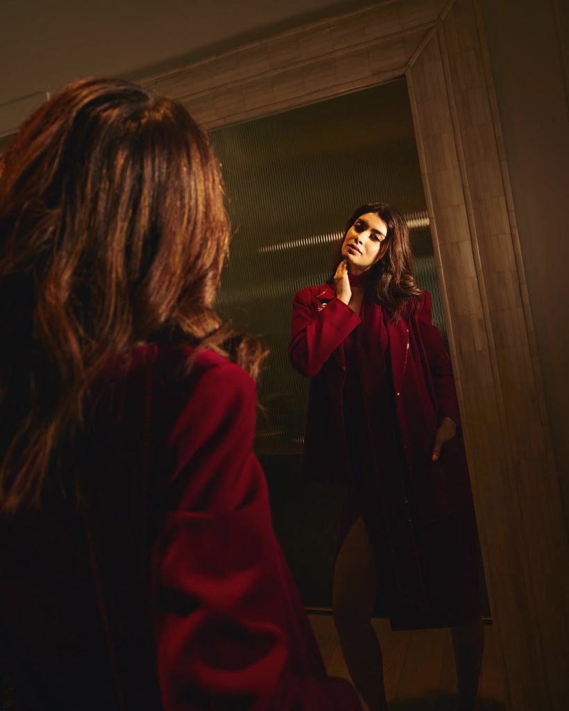 Diana Penty wearing striking red outfit in professional photoshoot