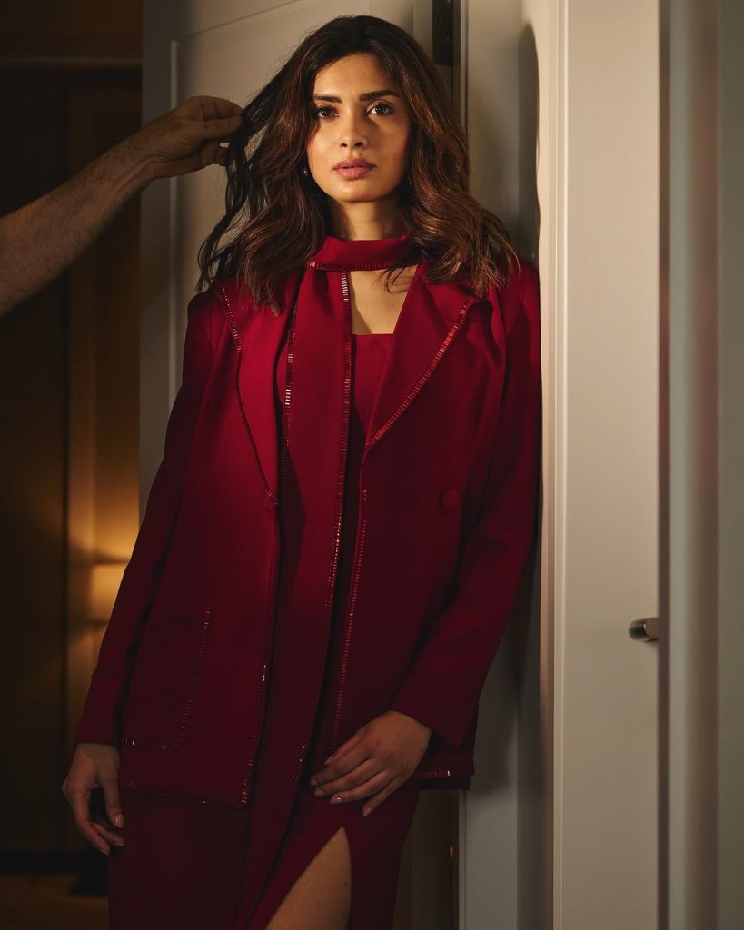 Diana Penty wearing striking red outfit in professional photoshoot