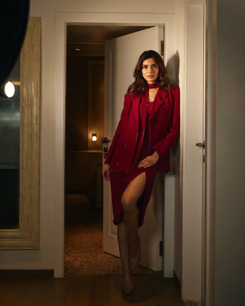 Diana Penty wearing striking red outfit in professional photoshoot