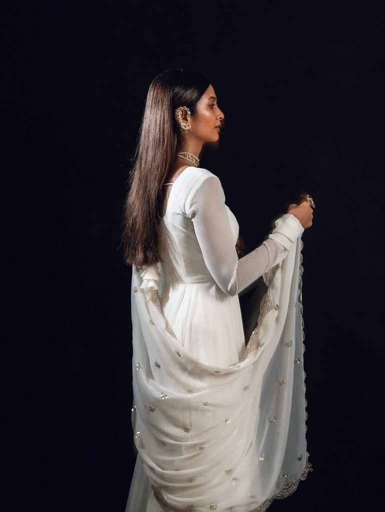 Keerthi Pandian's natural beauty with white dress styling