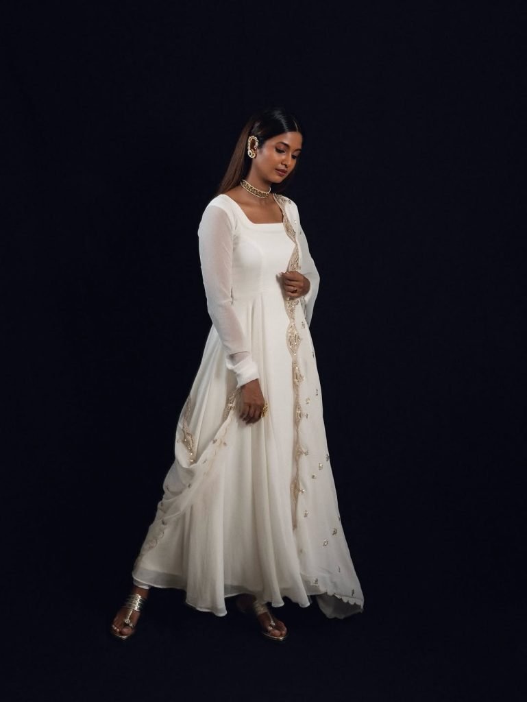Keerthi Pandian's natural beauty with white dress styling