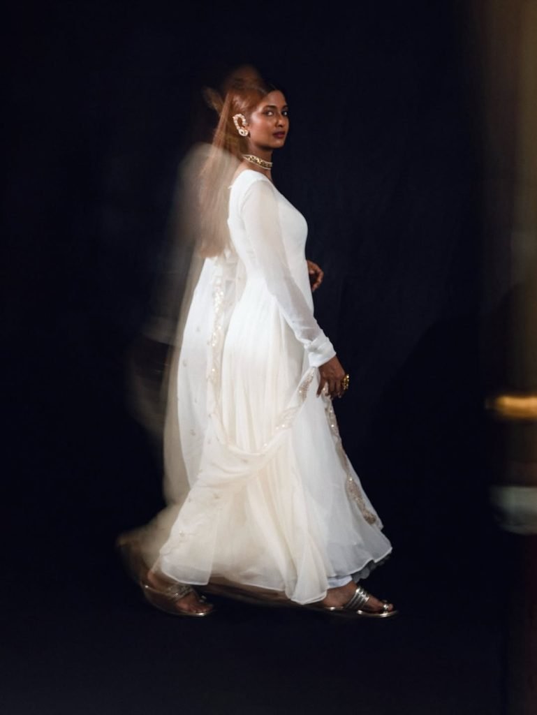 Keerthi Pandian wearing elegant white dress in stunning photoshoot