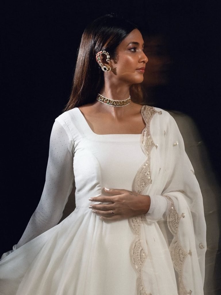 Keerthi Pandian wearing elegant white dress in stunning photoshoot