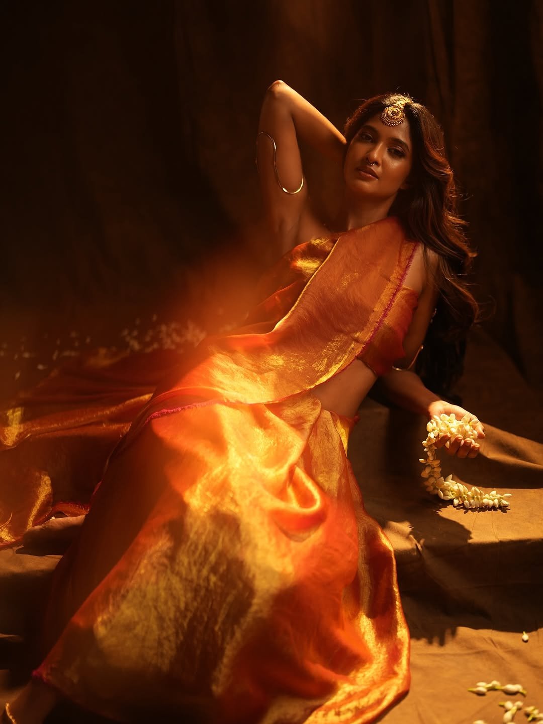 Keerthi Pandian posing beautifully with sophisticated makeup and hair