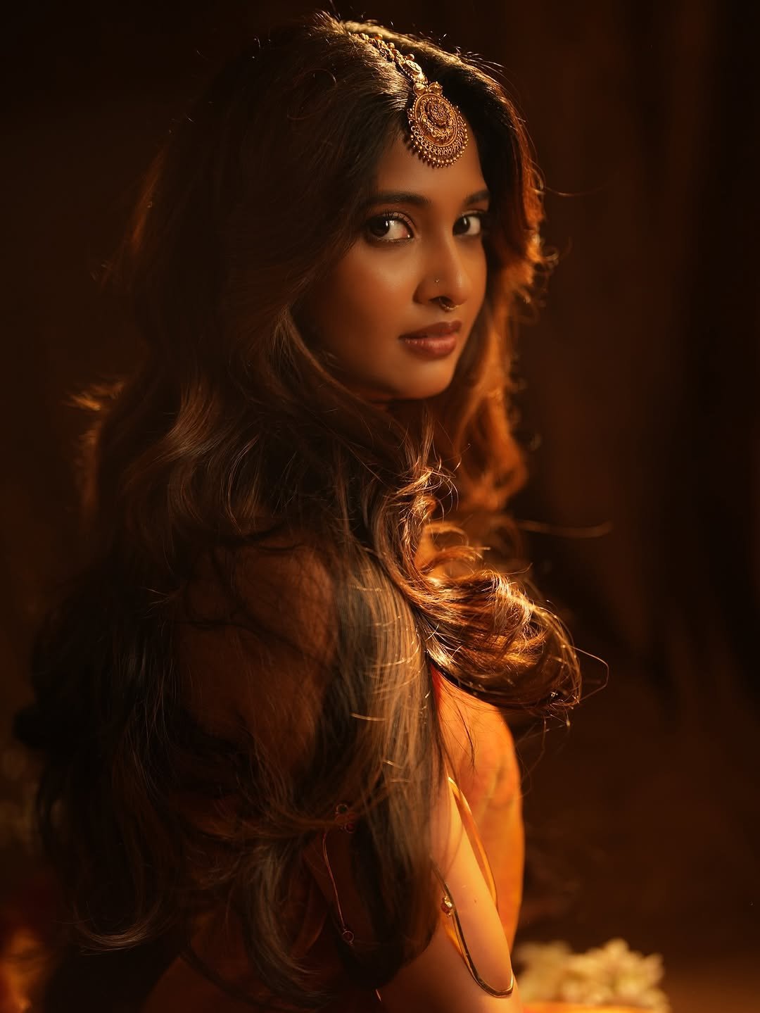 Keerthi Pandian posing beautifully with sophisticated makeup and hair