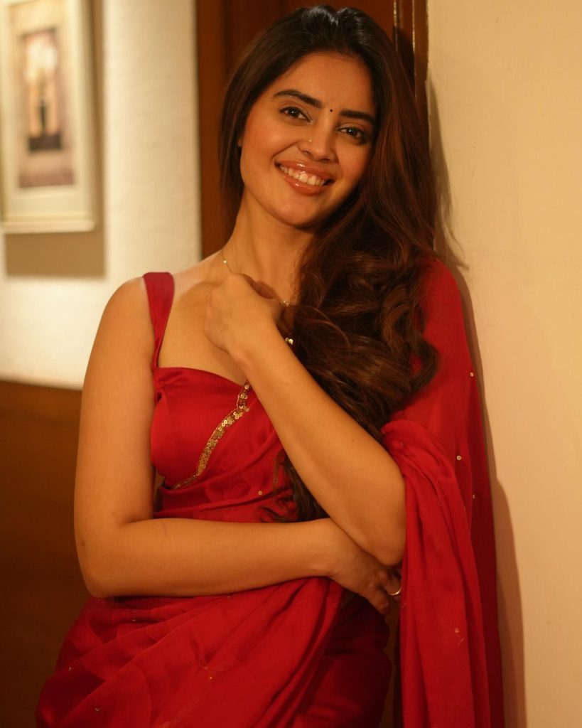 Kushitha Kallapu wearing stunning red saree in glamorous photoshoot