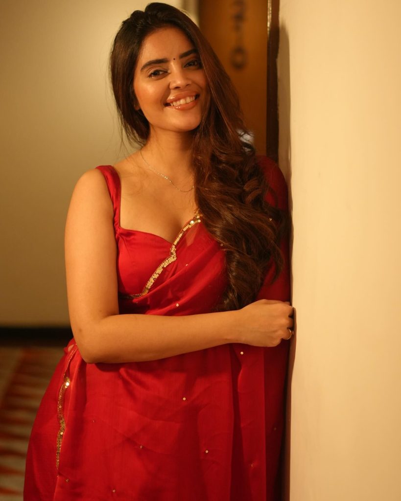 Kushitha Kallapu wearing stunning red saree in glamorous photoshoot