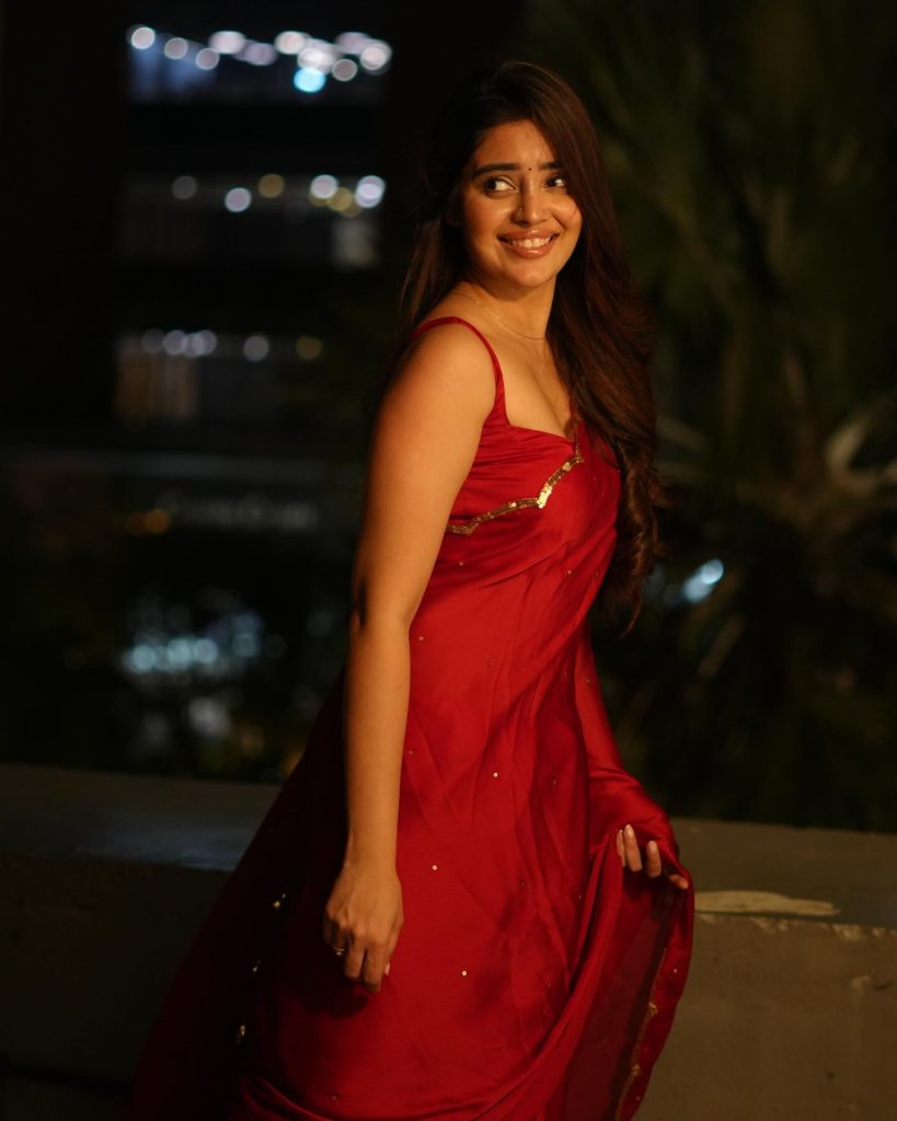 Kushitha Kallapu wearing stunning red saree in glamorous photoshoot