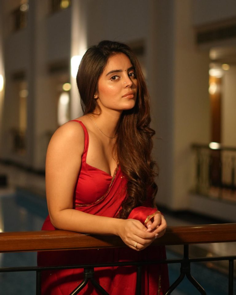 Kushitha Kallapu wearing stunning red saree in glamorous photoshoot