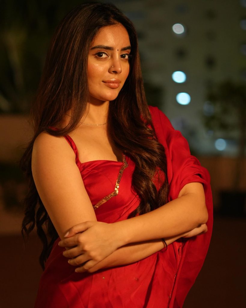 Kushitha Kallapu wearing stunning red saree in glamorous photoshoot