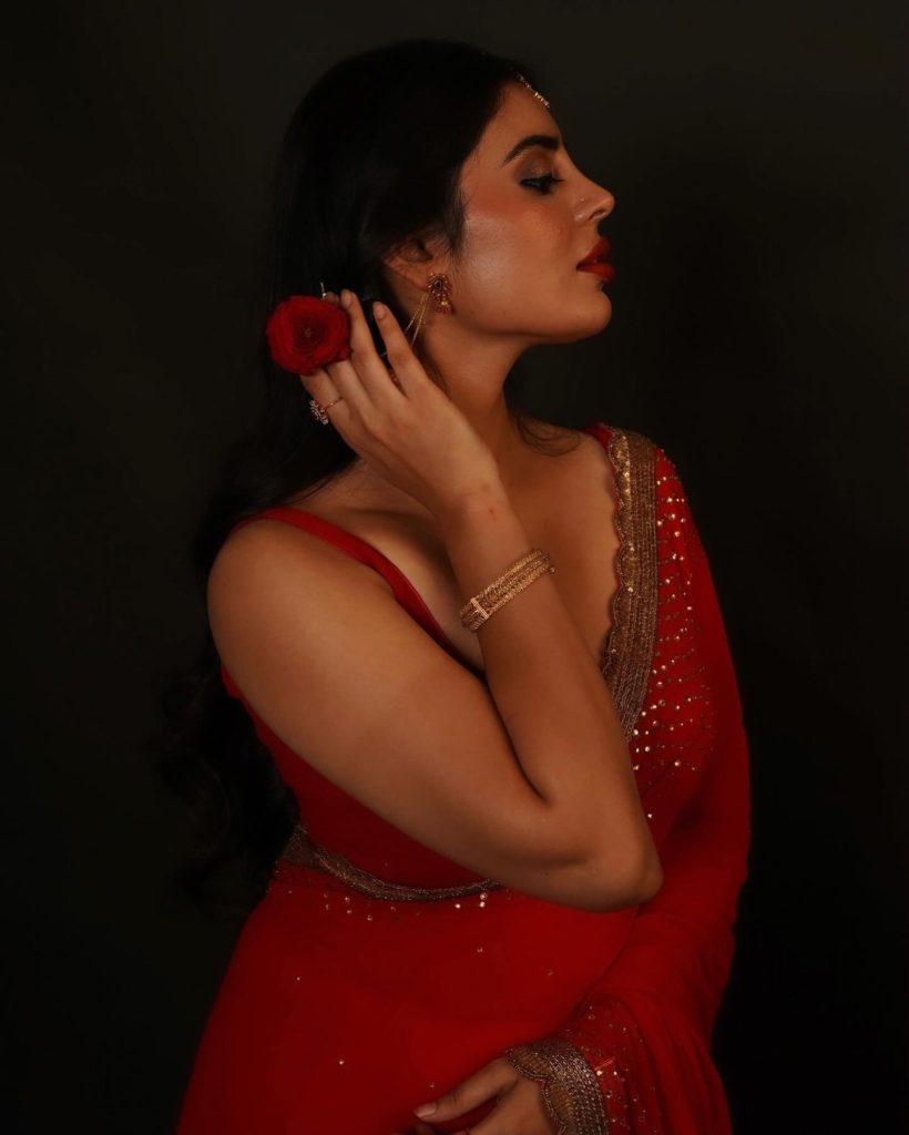 Kushitha Kallapu wearing stunning red saree