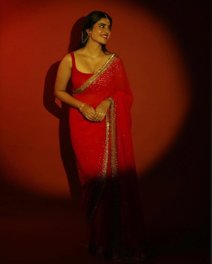 Kushitha Kallapu wearing stunning red saree