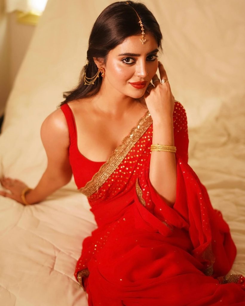 Kushitha Kallapu wearing stunning red saree