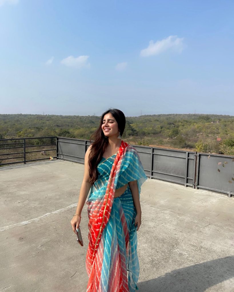 Kushitha Kallapu wearing elegant blue saree in traditional photoshoot