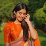 Kushitha Kallapu hot orange saree photoshoot in park