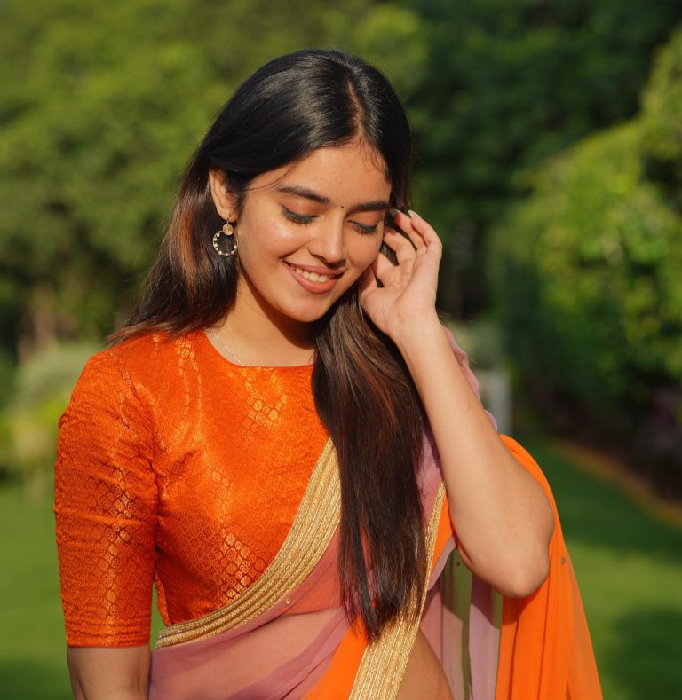 Kushitha Kallapu hot orange saree photoshoot in park
