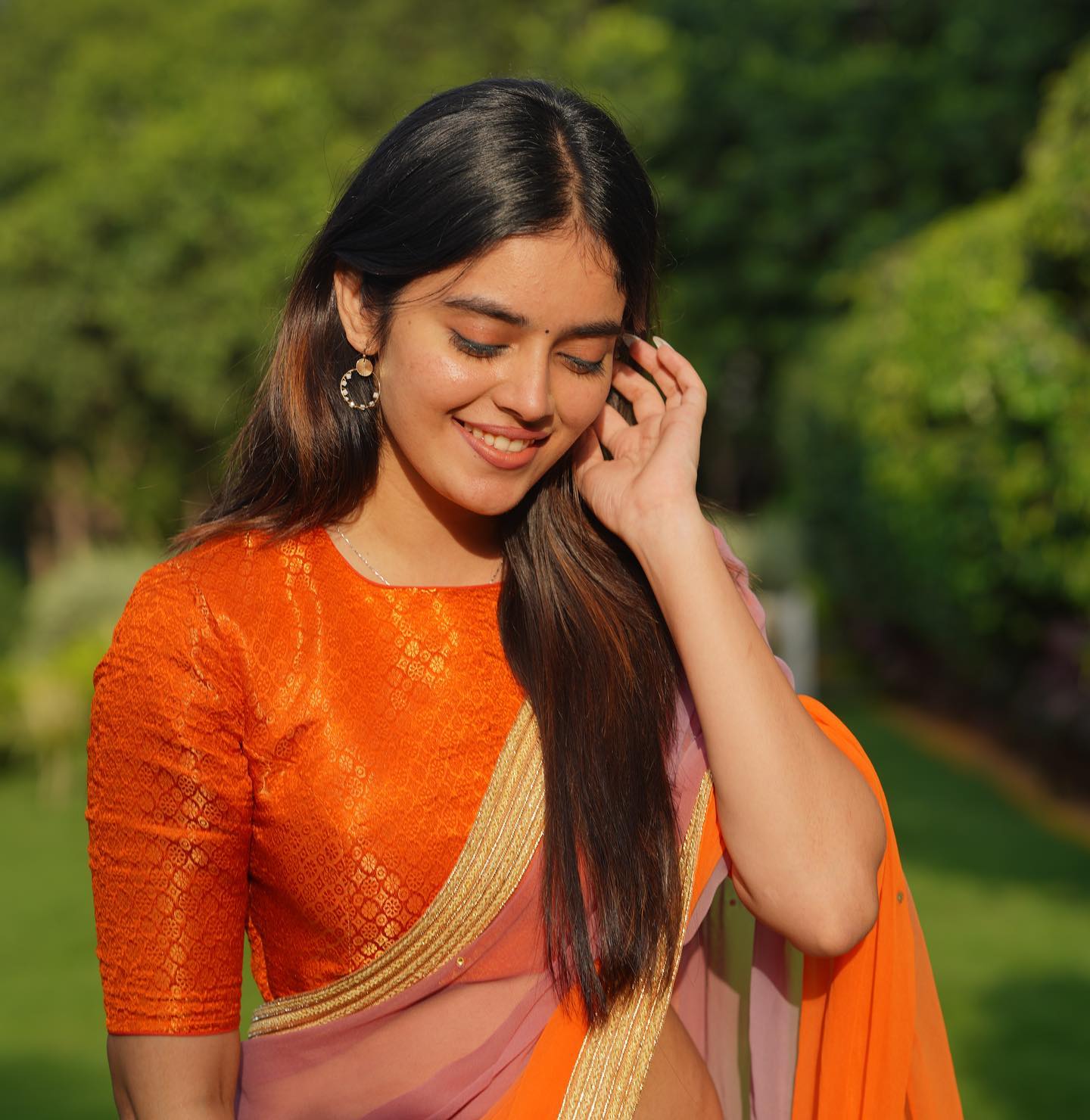 Kushitha Kallapu hot orange saree photoshoot in park