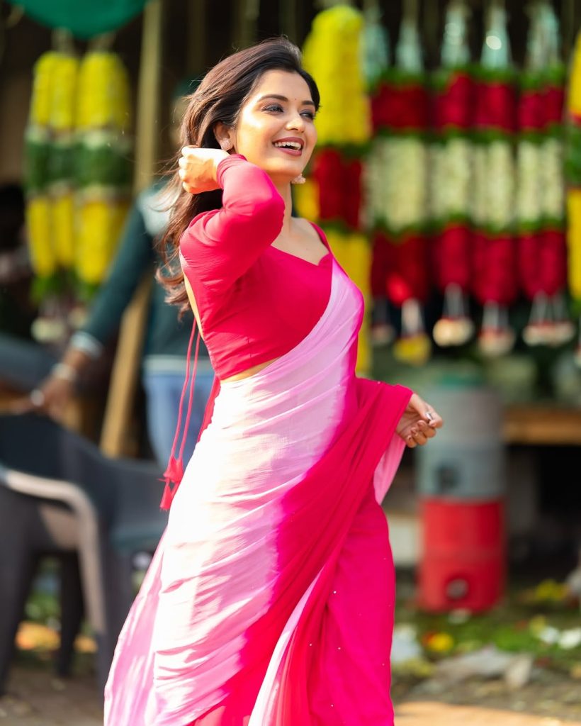 Priyanka Jain wearing beautiful pink saree with traditional styling