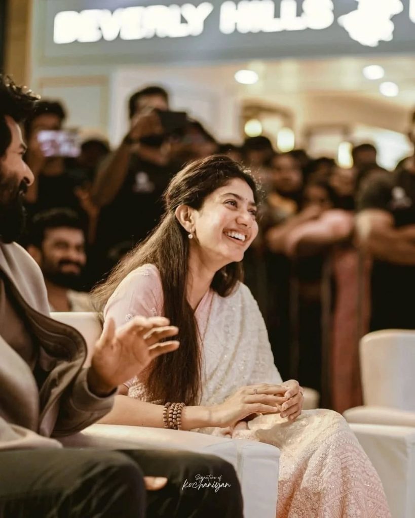 Sai Pallavi posing charmingly at Amaran film promotion event