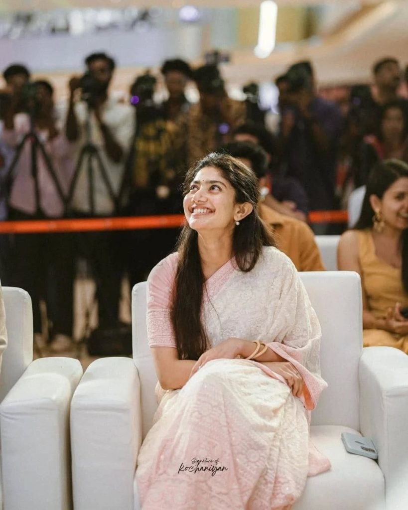 Sai Pallavi posing charmingly at Amaran film promotion event