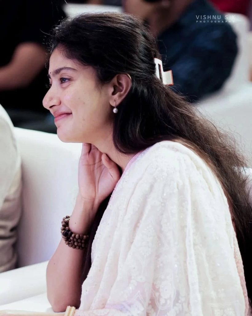 Sai Pallavi posing charmingly at Amaran film promotion event