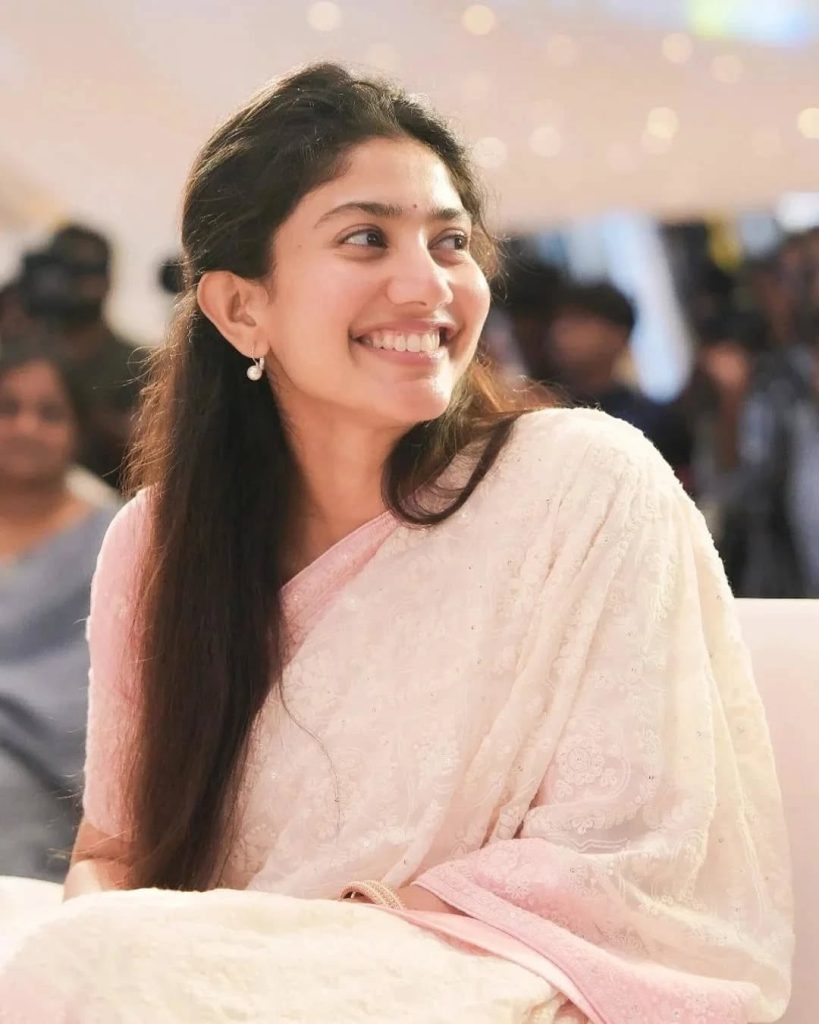 Sai Pallavi posing charmingly at Amaran film promotion event