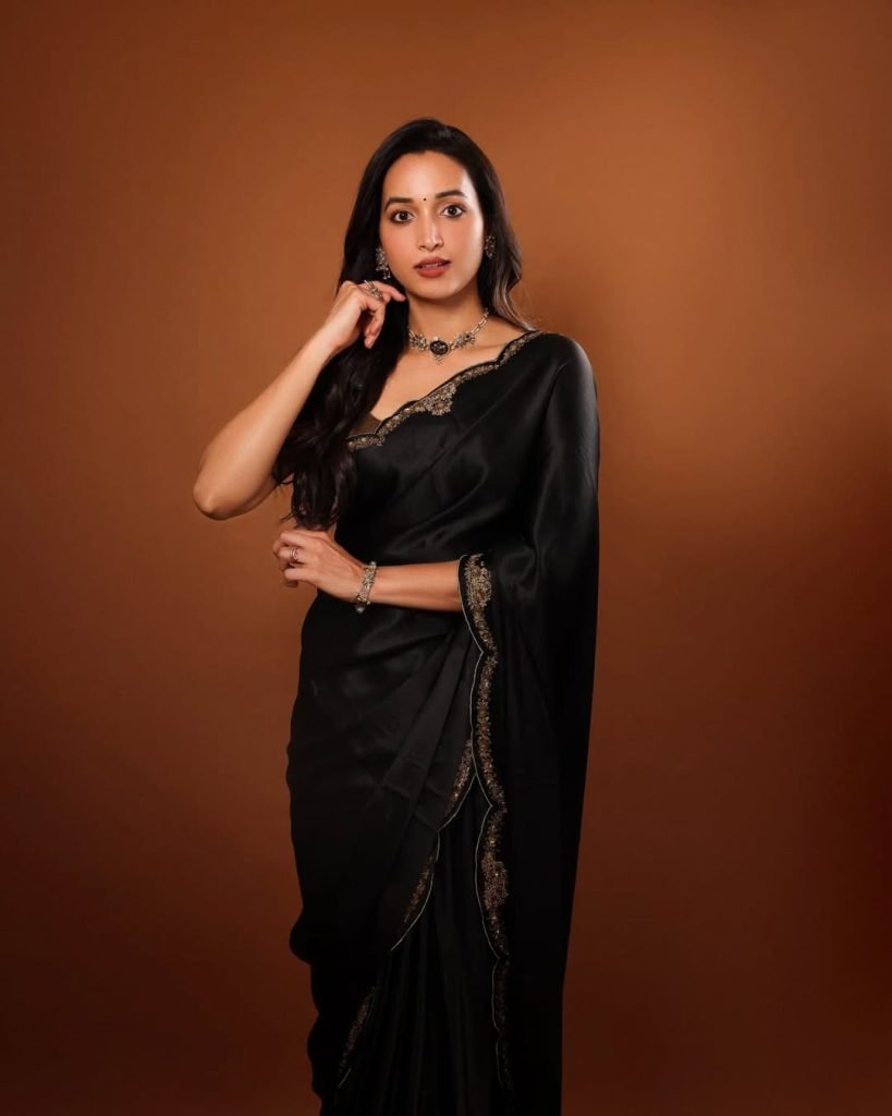 Srinidhi Shetty in elegant black saree at HIT movie promotion event