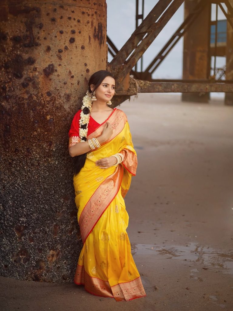 Vibrant yellow traditional wear reflects Aarushi Baruah's joyful personality