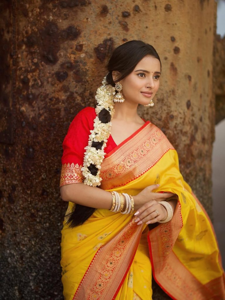 Vibrant yellow traditional wear reflects Aarushi Baruah's joyful personality