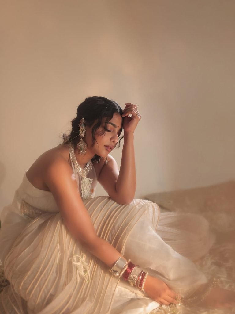 Innovative white transparent saree creates ethereal elegance for Aishwarya Lekshmi