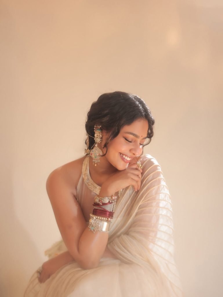 Innovative white transparent saree creates ethereal elegance for Aishwarya Lekshmi