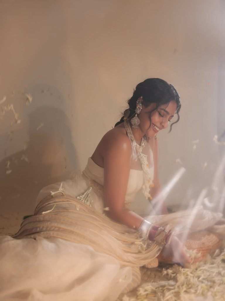 Innovative white transparent saree creates ethereal elegance for Aishwarya Lekshmi