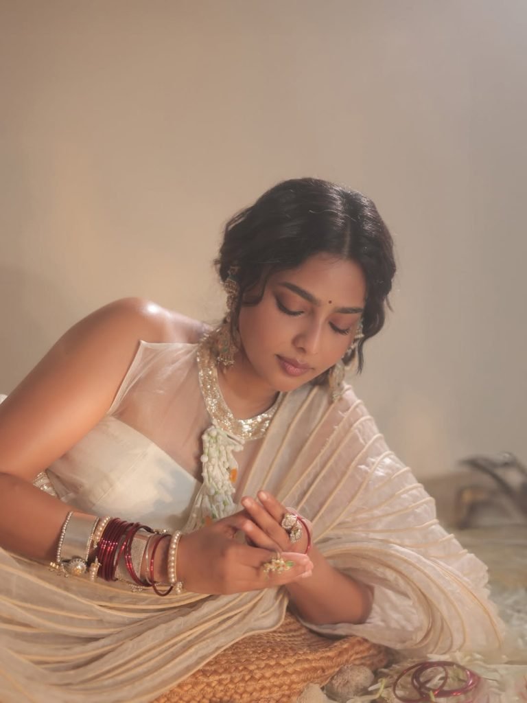 Innovative white transparent saree creates ethereal elegance for Aishwarya Lekshmi