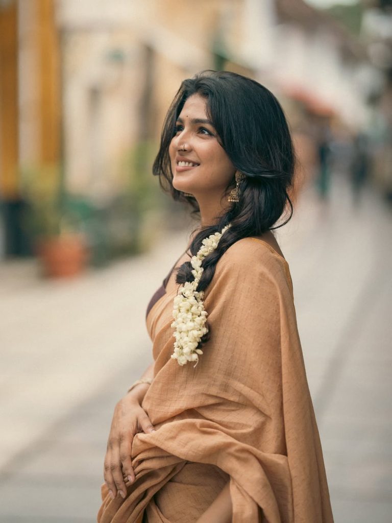 Casual saree draping highlights Anagha Ajith's natural comfort with traditional wear
