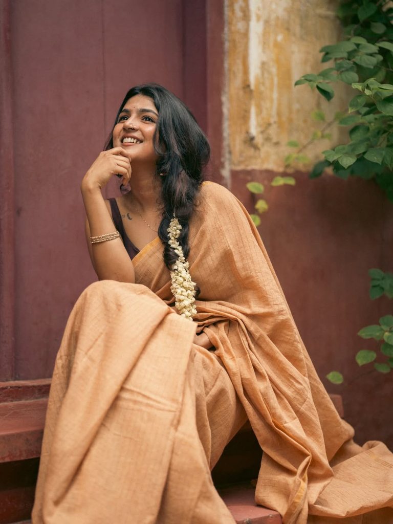 Casual saree draping highlights Anagha Ajith's natural comfort with traditional wear