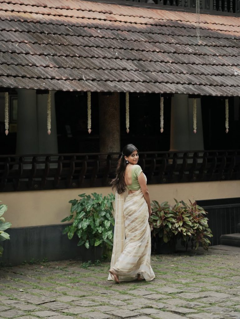 Festival white saree styling captures Ananthika Sanilkumar's cultural celebration spirit