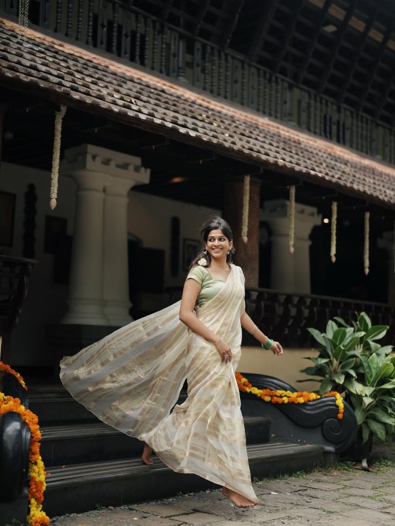Festival white saree styling captures Ananthika Sanilkumar's cultural celebration spirit